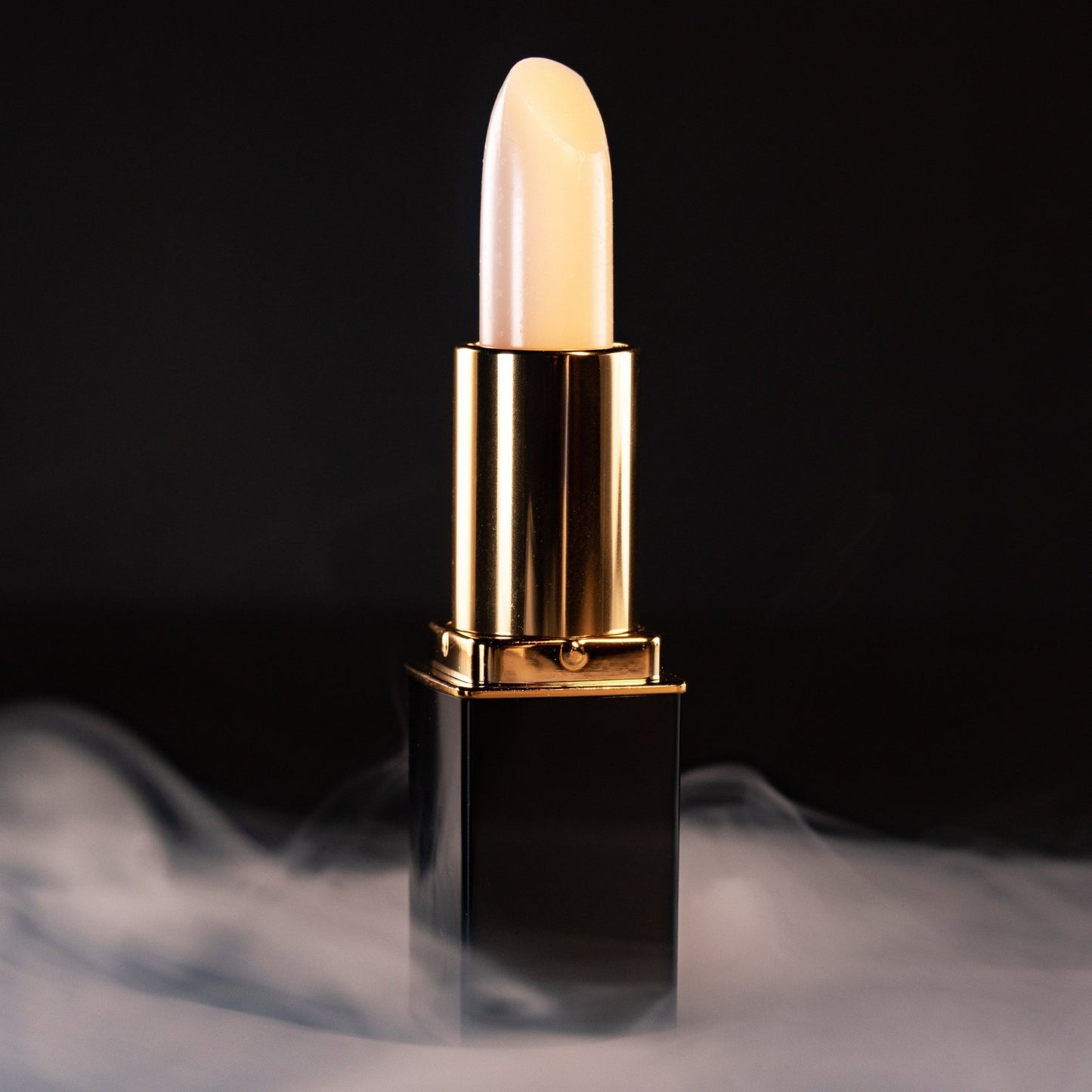 Close-up of white lipstick bullet in gold L’Paige casing